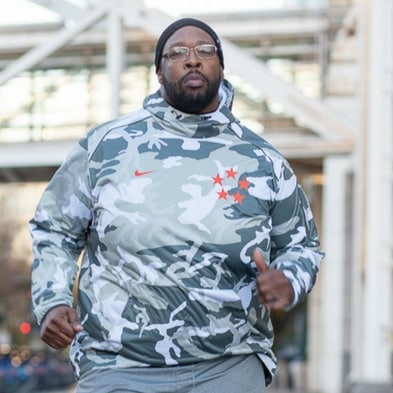 Martinus Evans, a fat man running and author of 300 Pounds and Running Podcast